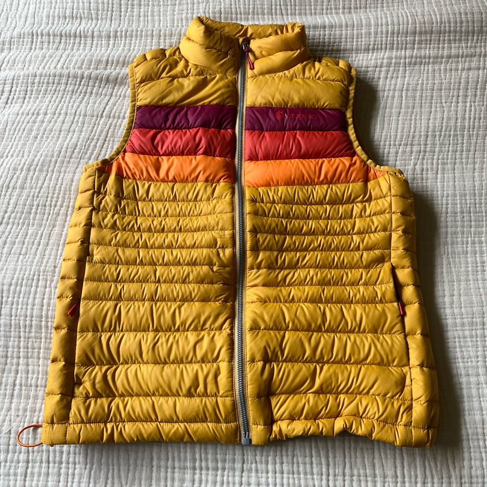 cotopaxi Yellow Puffer Jacket Interior Label